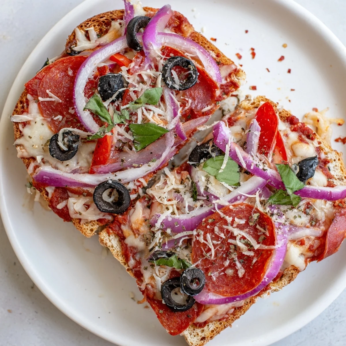 Golden, melty cheese blankets the surface of this easy Pizza Toast 2.0, ready to eat!