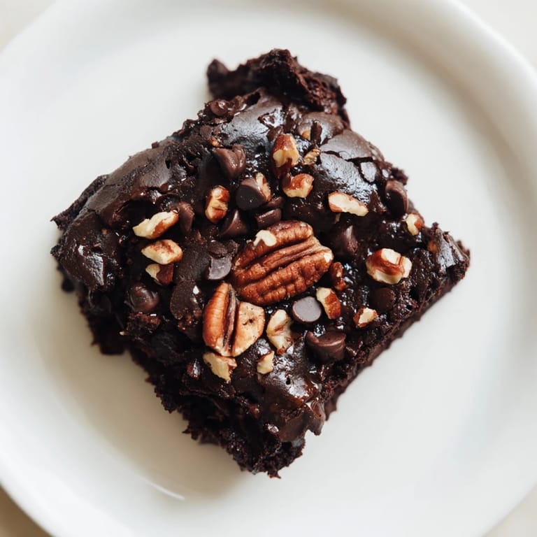 Freshly baked black bean brownies with a rich, chocolate aroma, perfect for dessert.